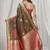 brown soft silk blend with fancy pom pom detailing festive wear saree