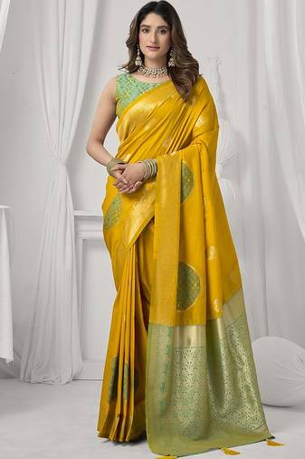 mustard soft silk blend with fancy pom pom detailing festive wear saree