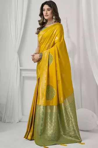 mustard soft silk blend with fancy pom pom detailing festive wear saree