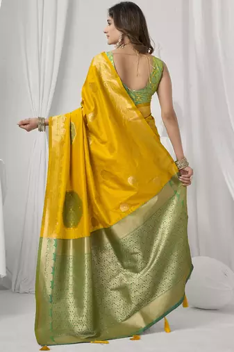 mustard soft silk blend with fancy pom pom detailing festive wear saree