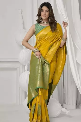 mustard soft silk blend with fancy pom pom detailing festive wear saree