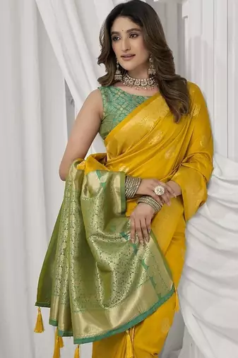 mustard soft silk blend with fancy pom pom detailing festive wear saree