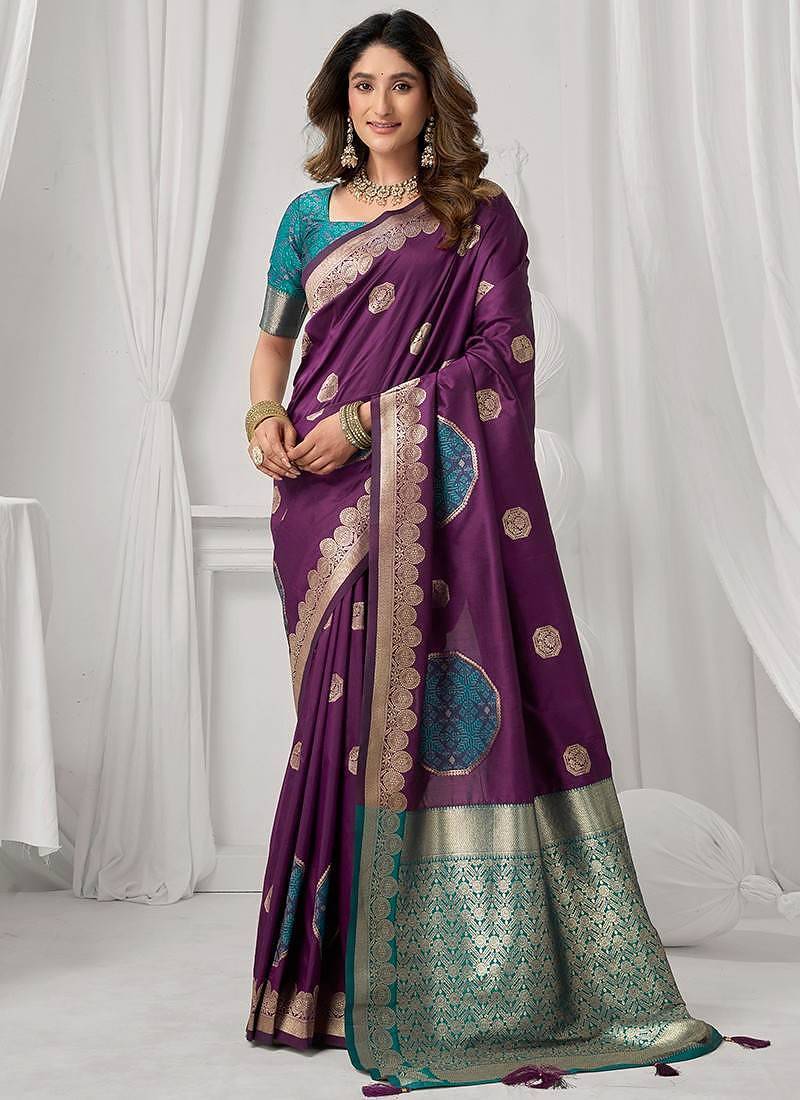 wine soft silk blend with fancy pom pom detailing festive wear saree