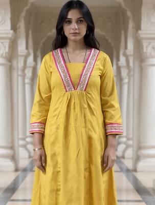 Yellow embroidered pure cotton kurta trouser set 1