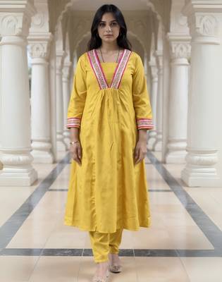 Yellow embroidered pure cotton kurta trouser set 4
