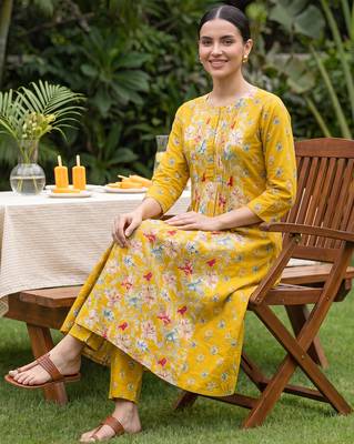 Yellow printed pure cotton kurta trouser set 1