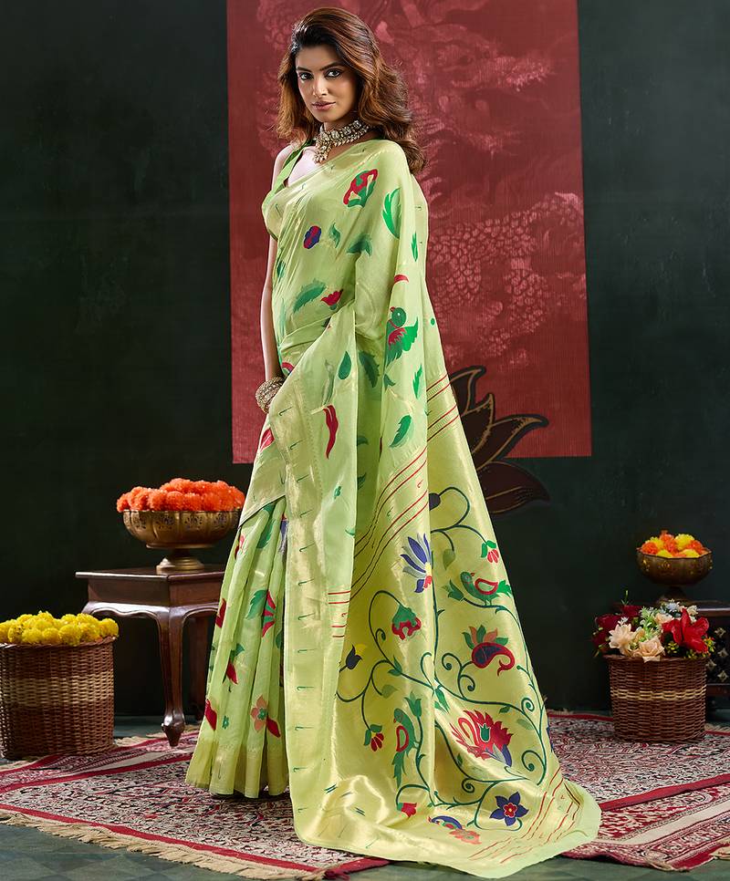 Light green color zari work cotton silk saree with blouse