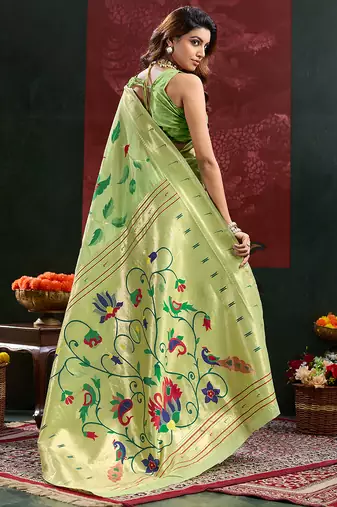 Light green color zari work cotton silk saree with blouse