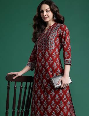 Orange printed pure cotton kurta trouser set 1