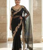 Black embroidered embellished zari net saree with unrtiched blouse piece