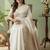White ethnic motifs woven design banarasi saree with unstitched blouse