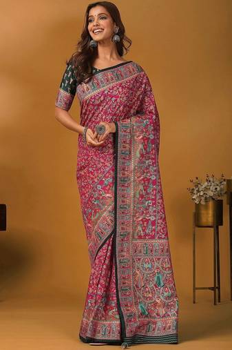 Pink position printed ethnic motifs banarasi saree with matching blouse