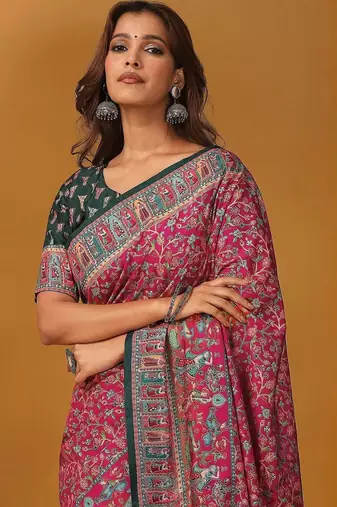Pink position printed ethnic motifs banarasi saree with matching blouse