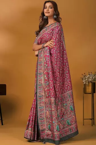 Pink position printed ethnic motifs banarasi saree with matching blouse