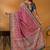 Pink position printed ethnic motifs banarasi saree with matching blouse