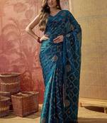 Teal printed sarees with blouse piece