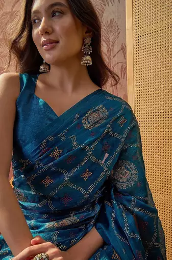 Teal printed sarees with blouse piece