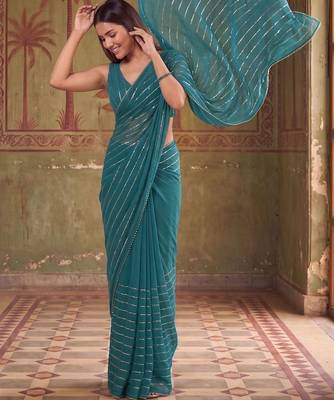 Teal striped sequinned poly georgette designer saree 1