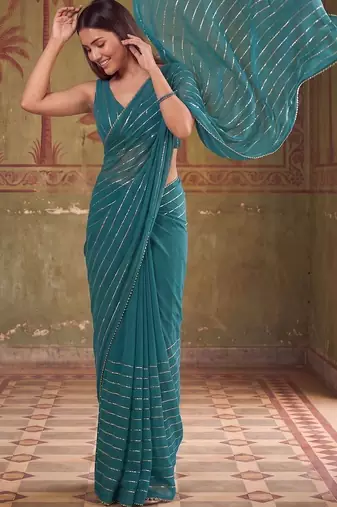 Teal striped sequinned poly georgette designer saree