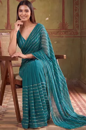 Teal striped sequinned poly georgette designer saree