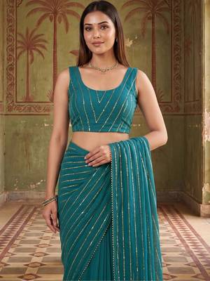 Teal striped sequinned poly georgette designer saree 5