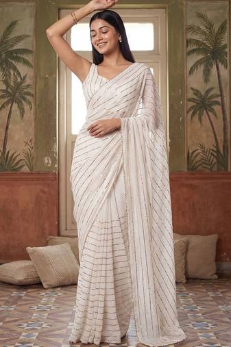 Off white embellished sequinned poly georgette saree