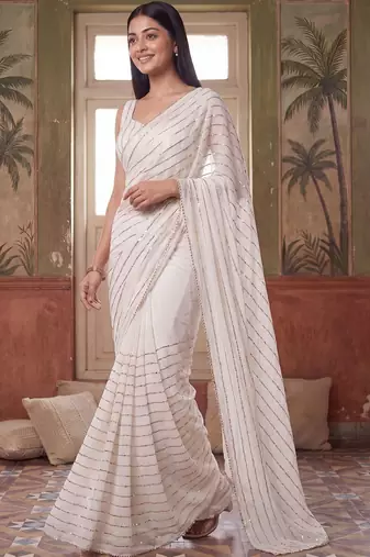 Off white embellished sequinned poly georgette saree