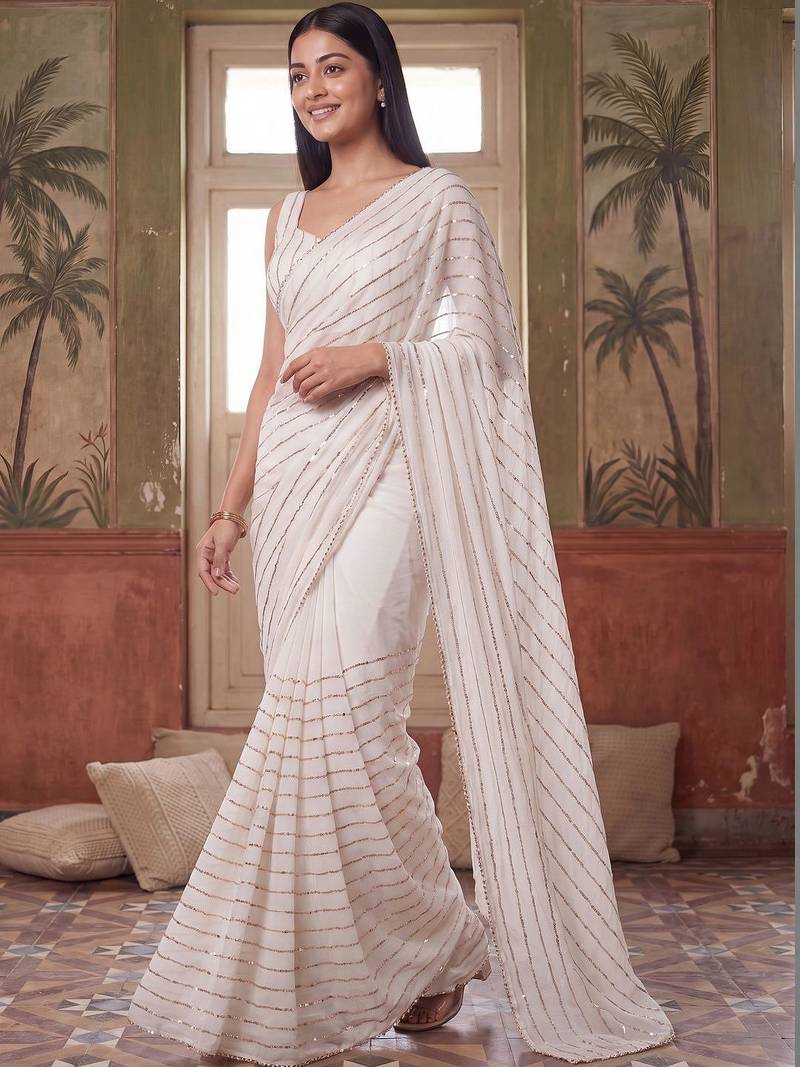 Off white embellished sequinned poly georgette saree