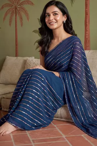 Navy blue women striped sequinned poly georgette saree