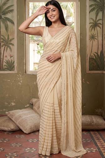 Cream striped sequinned poly georgette designer saree