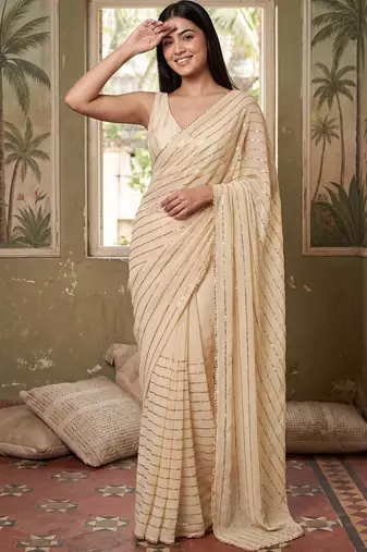 Cream striped sequinned poly georgette designer saree