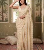 Cream striped sequinned poly georgette designer saree