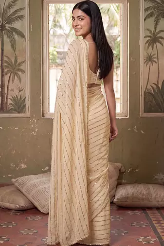 Cream striped sequinned poly georgette designer saree