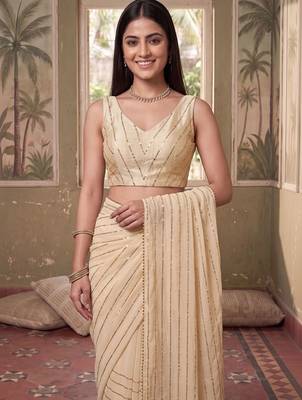 Cream striped sequinned poly georgette designer saree 5