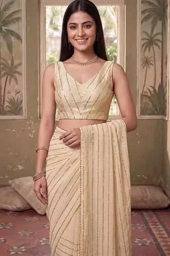 Cream striped sequinned poly georgette designer saree