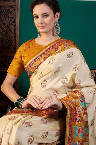 Cream ethnic motifs printed saree with unstitched blouse