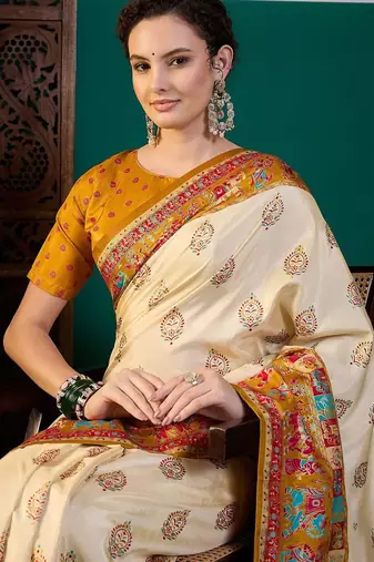 Cream ethnic motifs printed saree with unstitched blouse