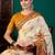 Cream ethnic motifs printed saree with unstitched blouse