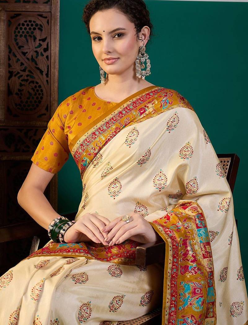 Cream ethnic motifs printed saree with unstitched blouse