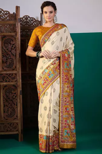 Cream ethnic motifs printed saree with unstitched blouse