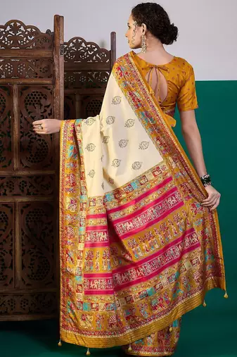 Cream ethnic motifs printed saree with unstitched blouse
