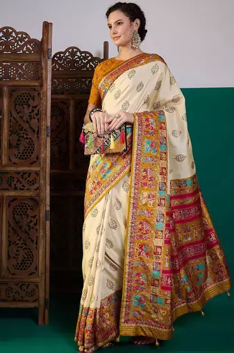 Cream ethnic motifs printed saree with unstitched blouse