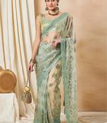 Green georgette embellished saree with matching blouse