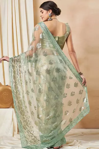Green georgette embellished saree with matching blouse