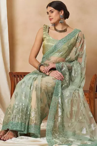 Green georgette embellished saree with matching blouse