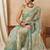 Green georgette embellished saree with matching blouse