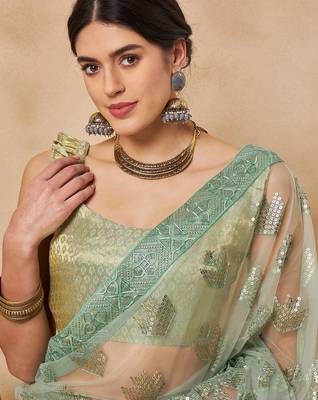 Green georgette embellished saree with matching blouse 5