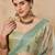 Green georgette embellished saree with matching blouse