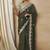 Olive embellished saree with matching blouse