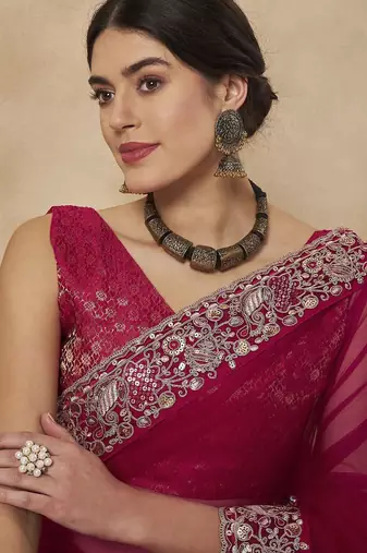 Pink embellished saree with matching blouse